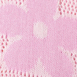 Close-up of pink floral mesh beach sweater crochet top by Trendsi with flower pattern
