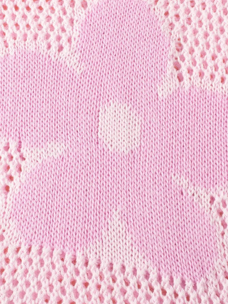 Close-up of pink floral mesh beach sweater crochet top by Trendsi with flower pattern