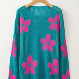 Trendsi floral mesh beach sweater crochet top in teal with pink flower patterns hanging on wooden hanger