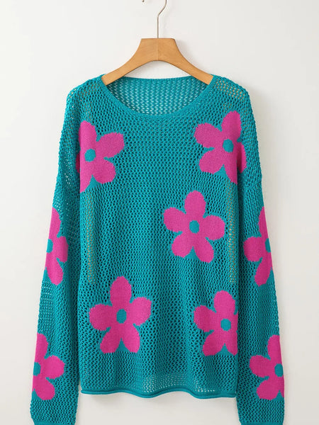 Trendsi floral mesh beach sweater crochet top in teal with pink flower patterns hanging on wooden hanger