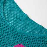 Trendsi floral mesh beach sweater crochet top in teal with pink flower detail close-up