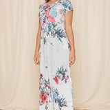 Babe Beachwaer floral midi shirt dress with short sleeves and colorful flower print on white fabric
