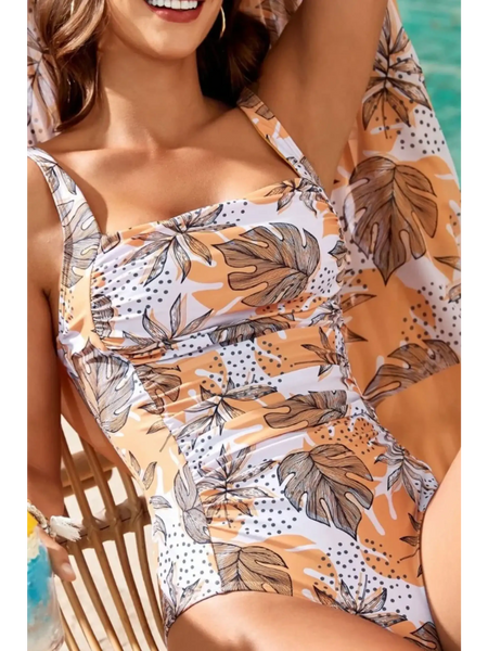 Beach Babes floral one piece swimsuit with tropical leaf pattern in white and orange