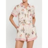 Trendsi floral resort romper for women with pink collar and hem detailing featuring tropical print