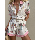 Trendsi floral resort romper for women with pink trim and tropical print on lightweight fabric