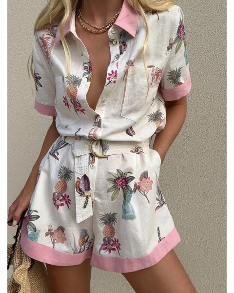 Trendsi floral resort romper for women with pink trim and tropical print on lightweight fabric