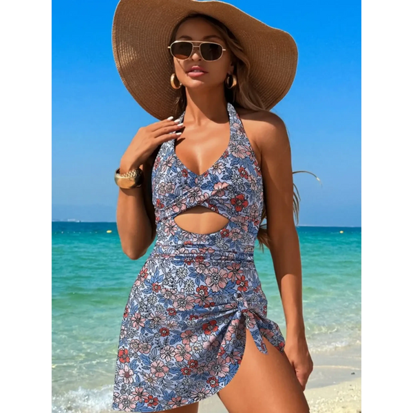 Beach Babes sexy cutout swim dress with floral print and halter neckline worn on the beach