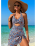 Beach Babes sexy cutout swim dress with floral print and halter neckline worn on the beach