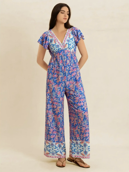 Trendsi floral wide leg jumpsuit for vacation in blue and pink with short sleeves and V-neck