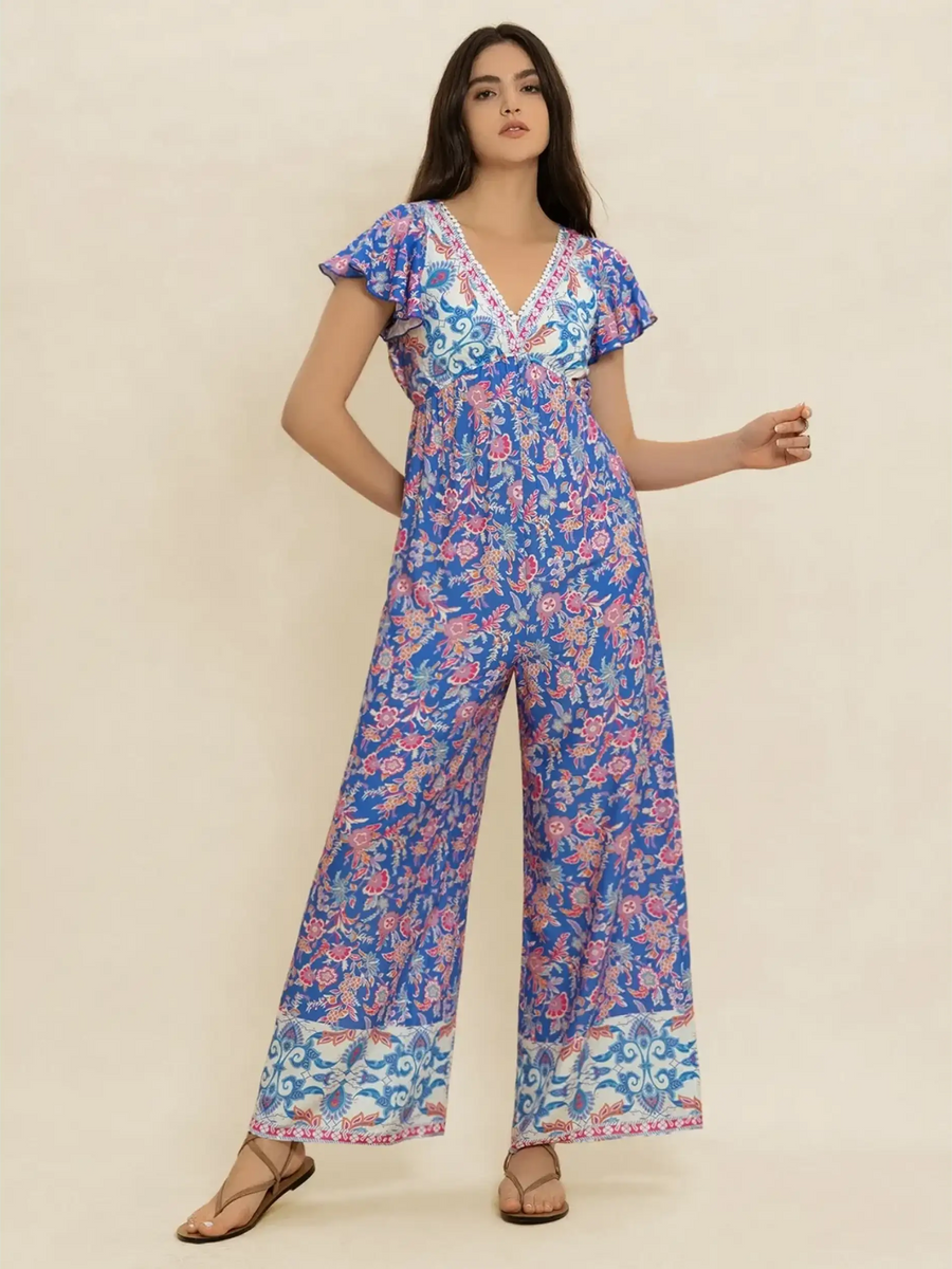 Trendsi floral wide leg jumpsuit for vacation with blue and pink patterns and short sleeves