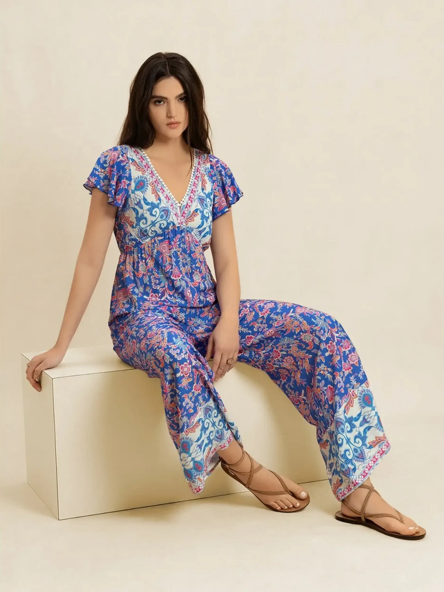 Trendsi floral wide leg jumpsuit for vacation with short sleeves and colorful pattern