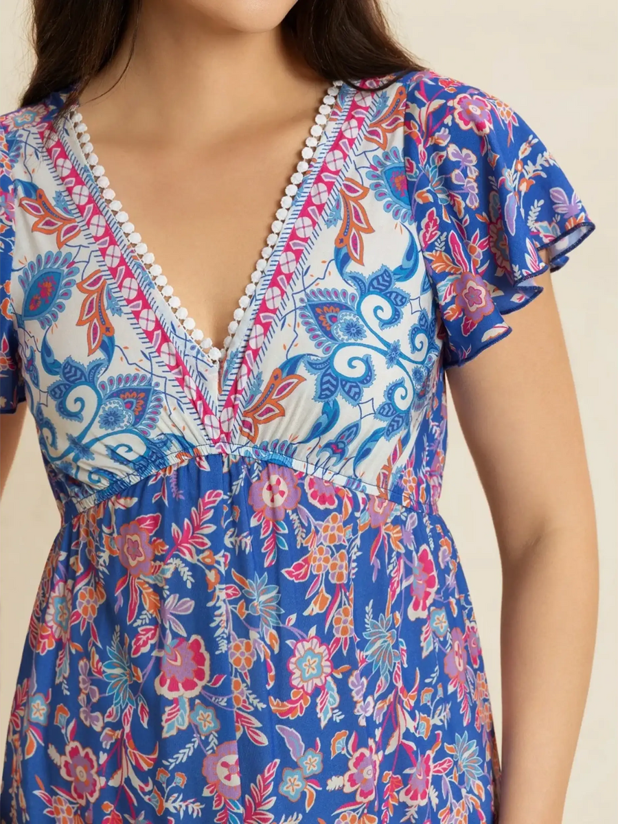 Trendsi floral wide leg jumpsuit for vacation with blue and pink patterns and deep V neckline