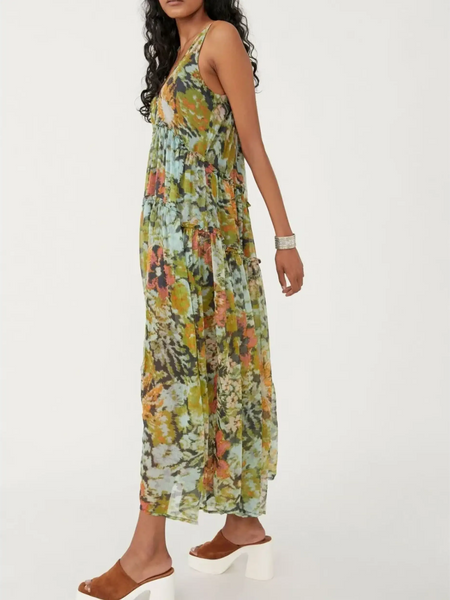 Trendsi flowy maxi dress for beach in green floral pattern worn with brown platform sandals