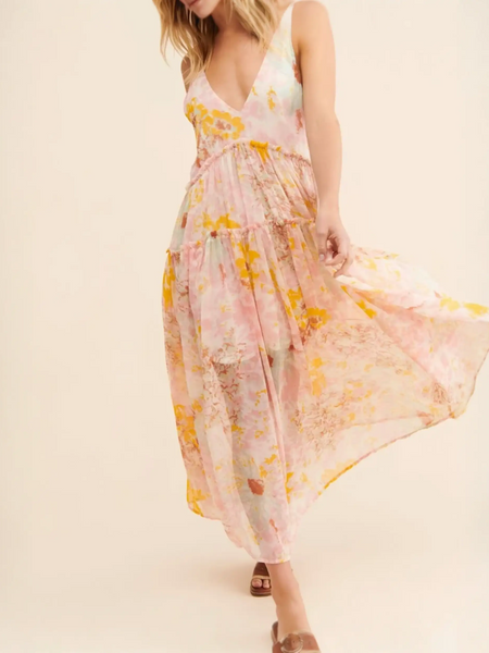 Trendsi flowy maxi dress for beach with pink and yellow floral pattern and V-neck design