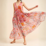 Trendsi flowy maxi dress for beach with colorful floral pattern and lightweight fabric