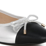 Rag Company nude and silver ballet flats with black toe cap and decorative bow detail