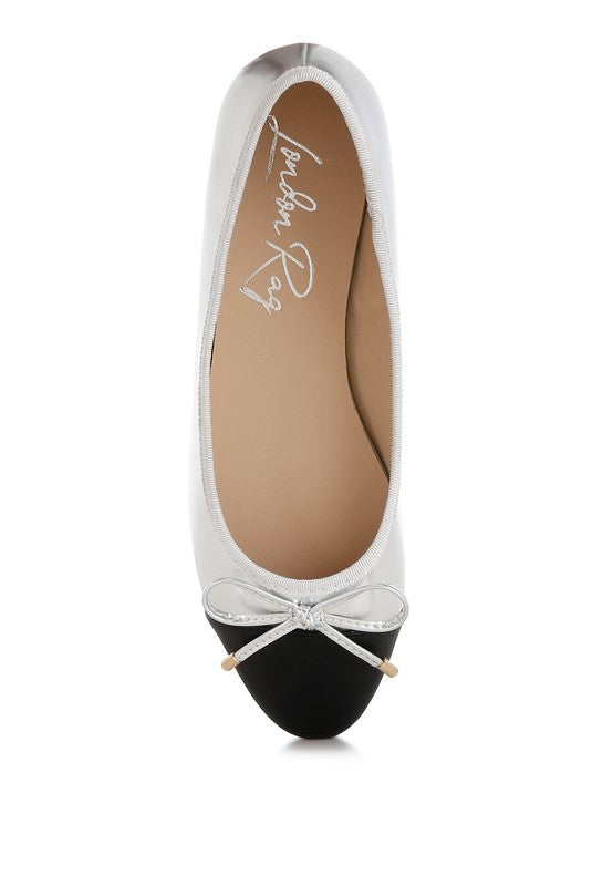Rag Company nude and silver ballet flats with black toe and decorative bow detail