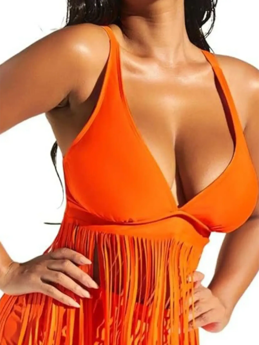 Beach Babes orange swimsuit with fringe detailing showcasing fun fringe beach swimwear style