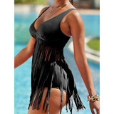 Beach Babes black swimsuit with fun fringe beach swimwear details near poolside