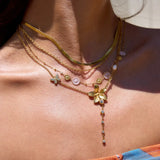 Trendsi 3 piece flower layer chain necklace in gold with floral charms and delicate design