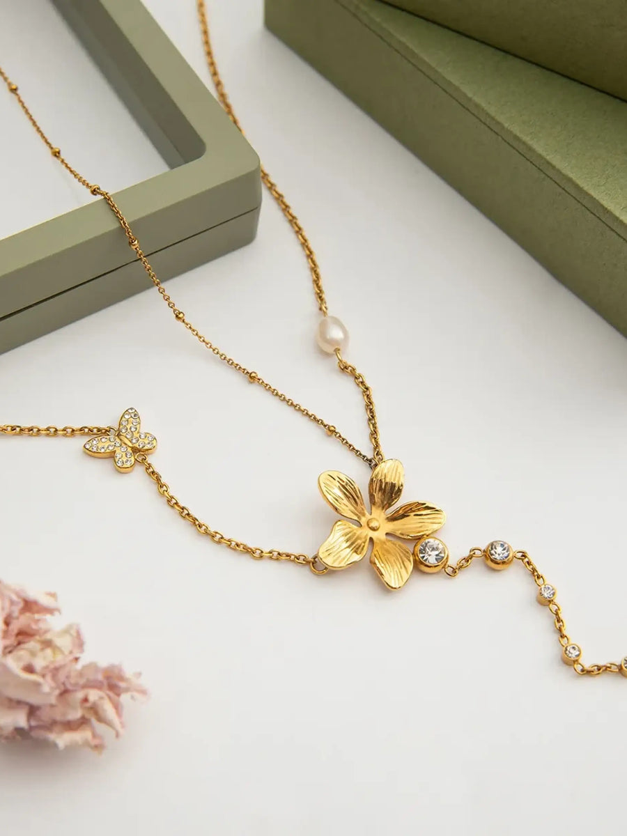 Trendsi 3 piece flower layer chain necklace with gold flower pendant and delicate butterfly charm