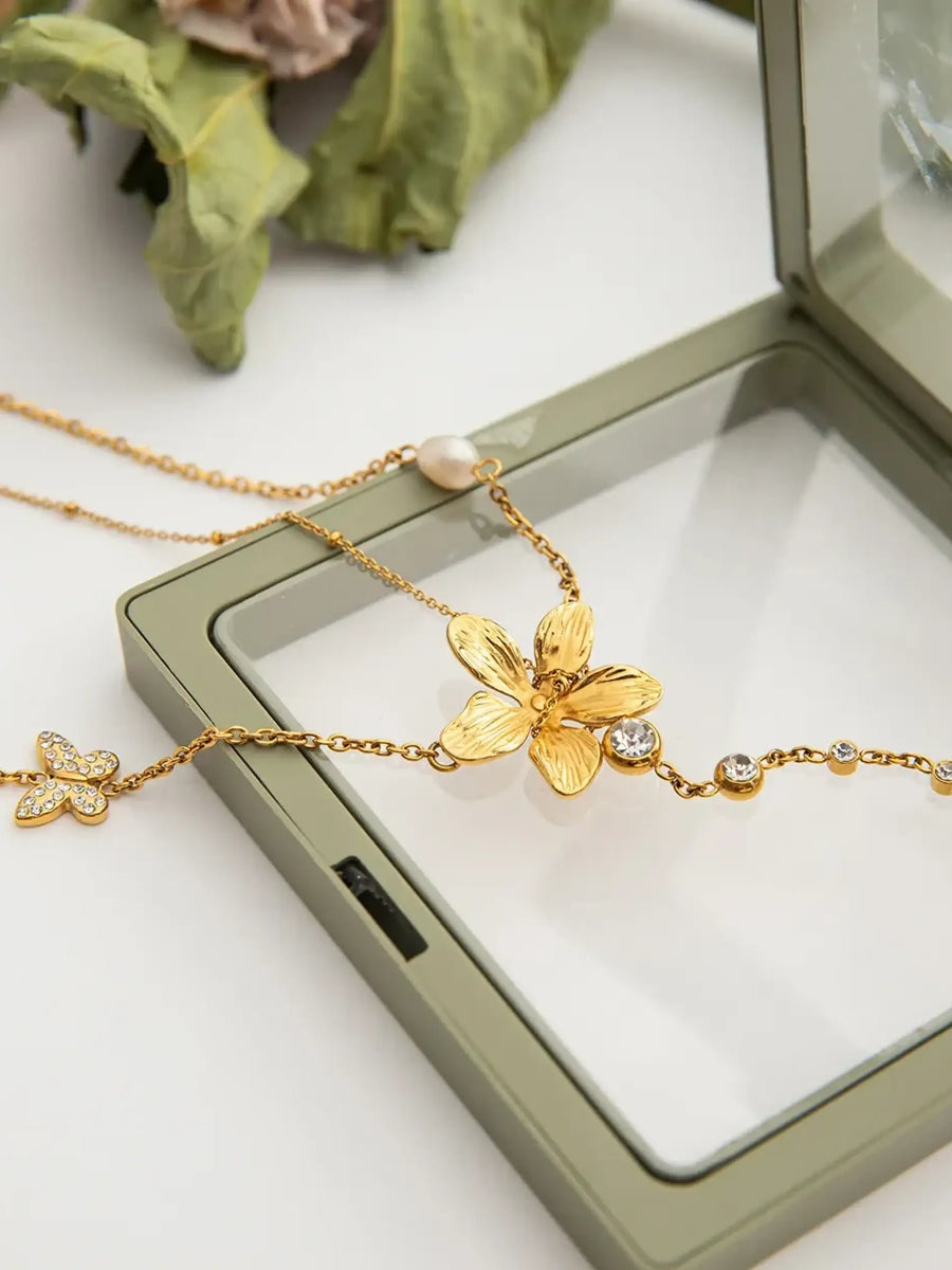 Trendsi 3 piece flower layer chain necklace with gold-tone floral and crystal accents
