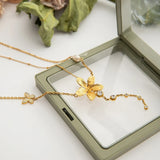 Trendsi 3 piece flower layer chain necklace with gold-tone floral and crystal accents
