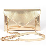 Babe Beachwaer gold envelope clutch for women with a chain strap and sleek metallic finish
