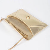 Babe Beachwear gold envelope clutch for women with chain strap and snap button closure
