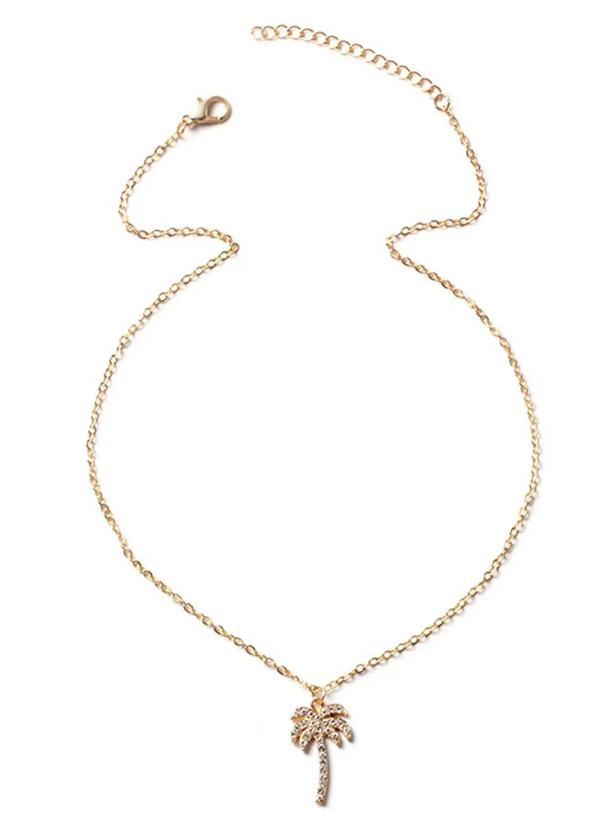 Gold palm tree pendant necklace from Trendsi with delicate chain and sparkling stones