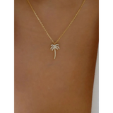  gold palm tree pendant necklace with sparkling stones on delicate chain