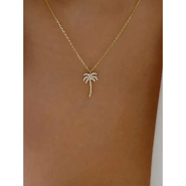  gold palm tree pendant necklace with sparkling stones on delicate chain