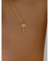  gold palm tree pendant necklace with sparkling stones on delicate chain