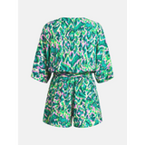 Babe Beachwear blue batwing romper for travel with green and pink abstract print and waist tie