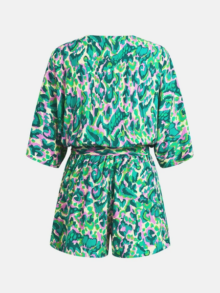 Babe Beachwear blue batwing romper for travel with green and pink abstract print and waist tie