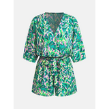 Babe Beachwear blue batwing romper for travel featuring vibrant green and blue pattern with waist tie