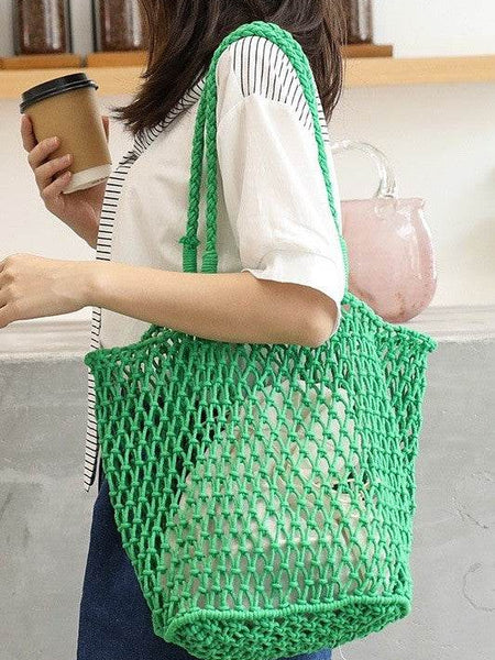 Miss Sparkling green braided net beach tote carried by woman with coffee cup and casual outfit
