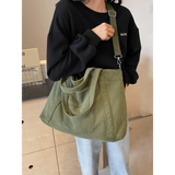 Babe Beachwaer lightweight Ladies duffle bag in olive green corduroy fabric carried on shoulder