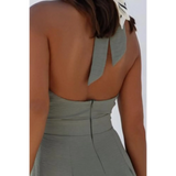 Back view of Babe Beachwear halter neck wide leg jumpsuit in gray with bow tie detail