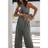 Babe Beachwear halter neck wide leg jumpsuit in olive green with sleeveless design and flowing pants