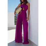 Babe Beachwear halter neck wide leg jumpsuit in purple with cutout detail and side pockets