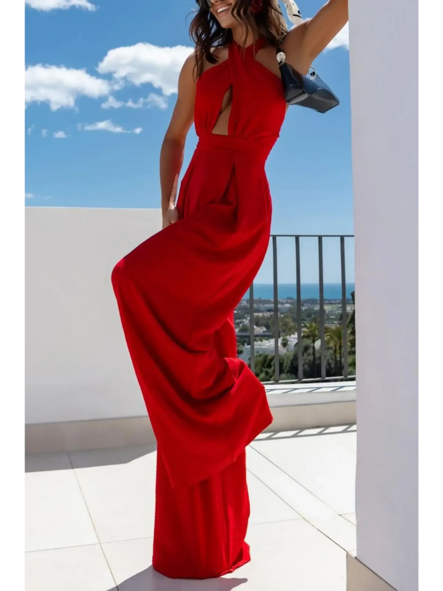 Babe Beachwear red halter neck wide leg jumpsuit with cutout detail worn outdoors