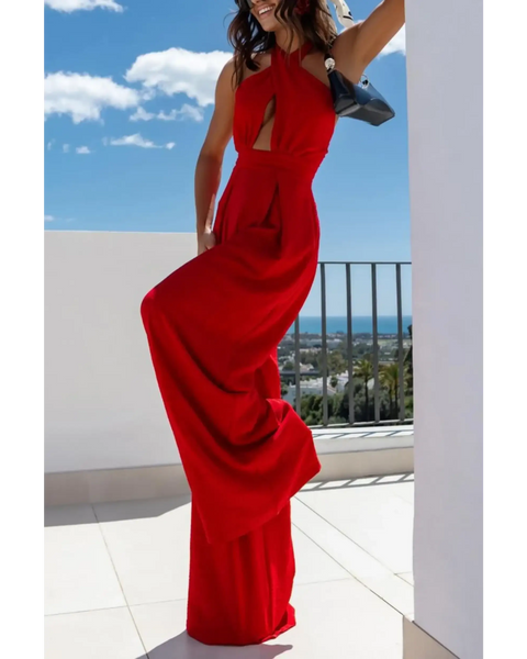 Babe Beachwear red halter neck wide leg jumpsuit with cutout detail worn outdoors
