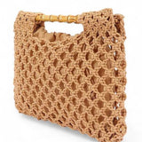 Artini Accessories crochet bamboo handle clutch in tan with intricate woven design and bamboo handles studio image