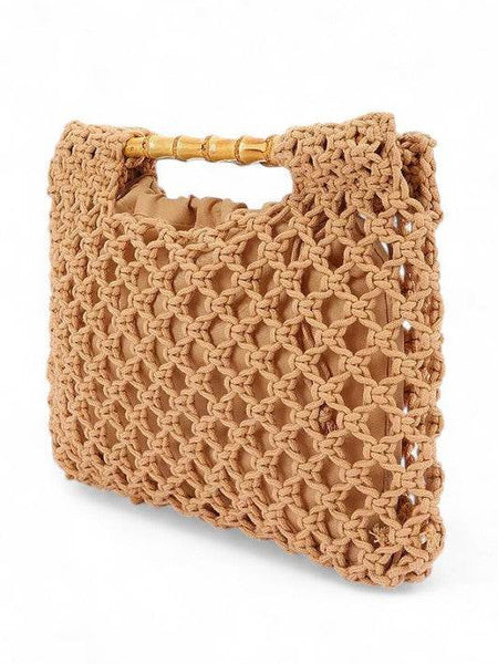 Artini Accessories crochet bamboo handle clutch in tan with intricate woven design and bamboo handles studio image