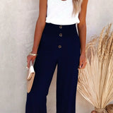 Babe Beachwear high waisted beach pants set in navy with button detail and wide leg design
