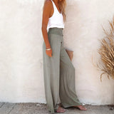 Babe Beachwear high waisted beach pants set in light olive with wide legs and smocked waistband