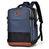 Babe Beachwaer Himawari Carry On Travel Backpack in navy blue with black and brown accents