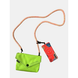 Babe Beachwaer Himawari Crossbody Phone Wallet in bright green with long strap holding a phone