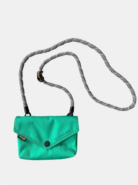 Babe Beachwaer Himawari Crossbody Phone Wallet in green with black and white adjustable strap